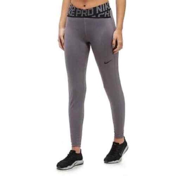 Nike Pants - Nike pro dri-fit grey leggings with crossover waistband